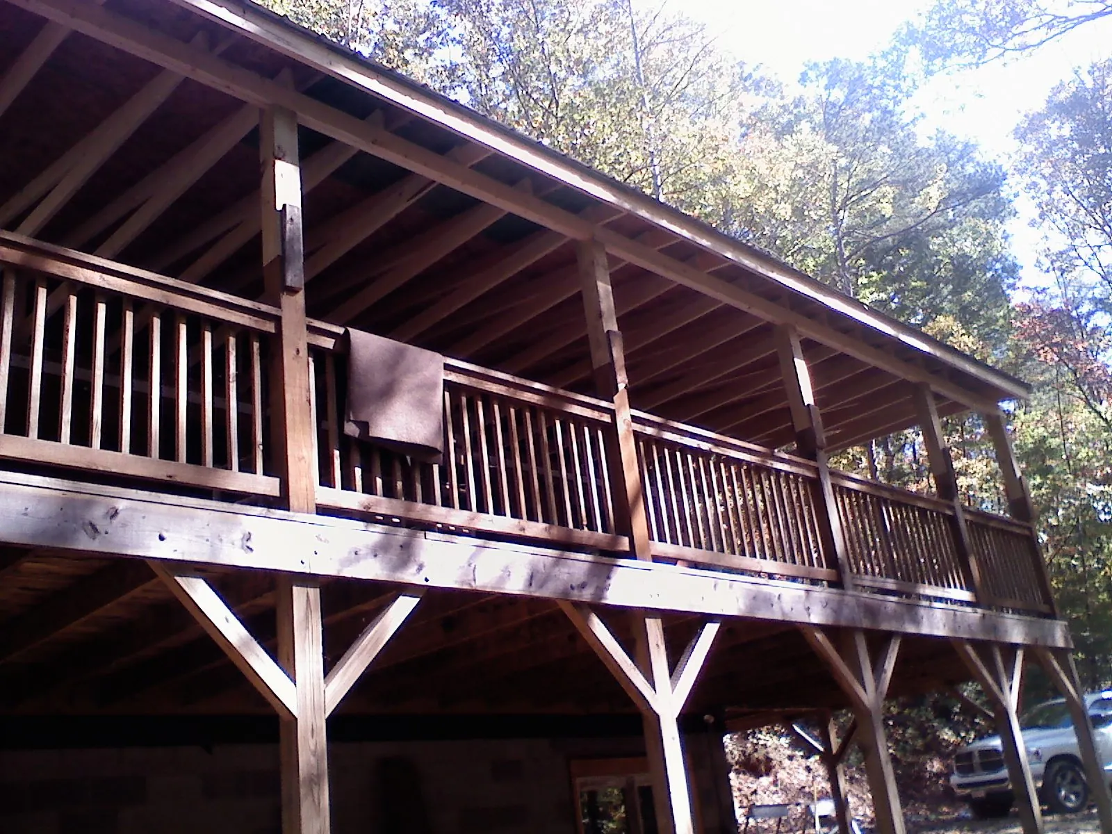 Timber framing under a new elevated porch and deck — Roof Leak Repair in Elmont by Roofing Brothers